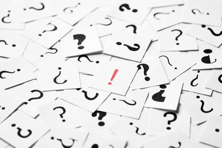 Pile of question mark signs scattered aroundの写真素材