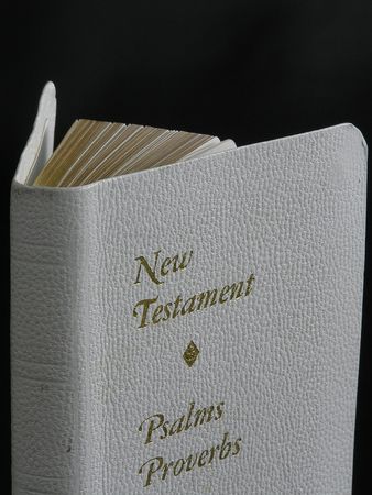 On a photo on a black background the New testament. The photo is made in Ukraine.の写真素材