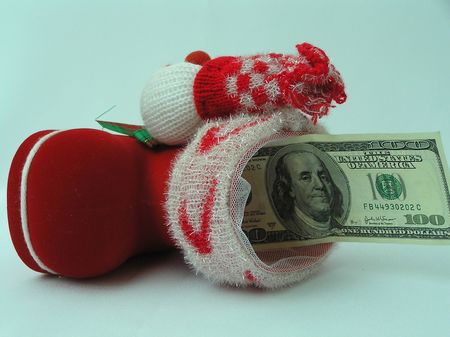 On a photo a boot for gifts with 100 dollar denomination. A boot red. The photo is made in Ukraineの写真素材