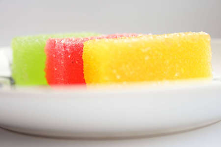 On a photo fruit candy of red, green yellow color.の写真素材