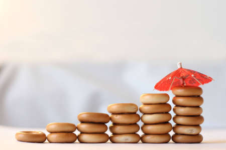 on photo heap bagel and red umbrellaの写真素材