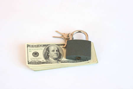 padlock and   hundreds  banknote  isolated on whiteの写真素材