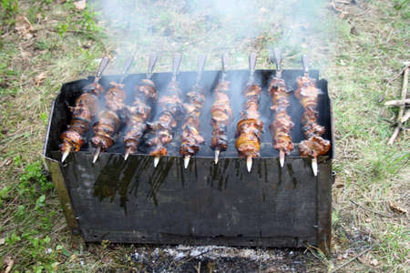 Barbecue on the chargrill with smokeの写真素材