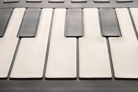 Closeup detail of a piano keyboard