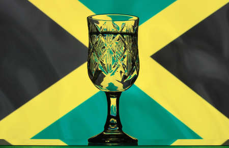Glass on the background of the flag of Jamaicaの写真素材
