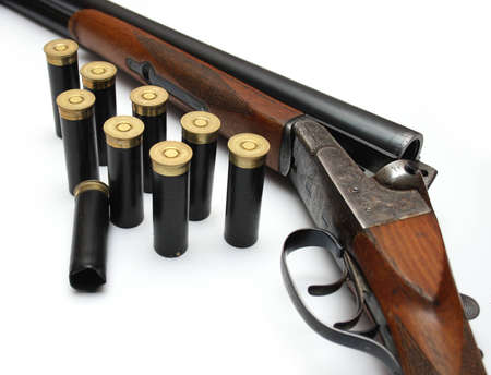 Isolated shot of shotgun with ammunitionの写真素材