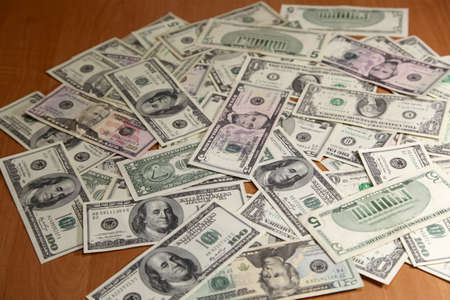 Money in wooden table