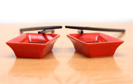 sticks red plate with the sauce on the tableの写真素材