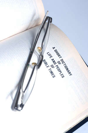 Open Bible with glasses