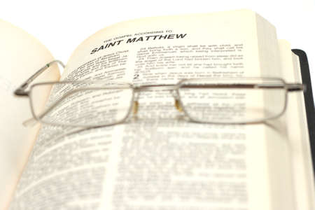 Open Bible with glasses
