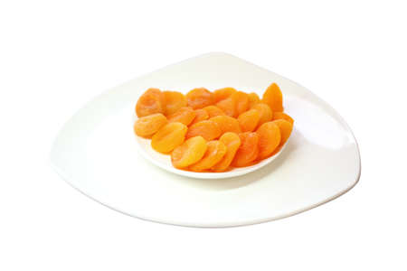 Dried apricots on a plateの写真素材