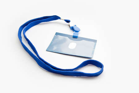 badge with blue ribbon isolated on whiteの写真素材