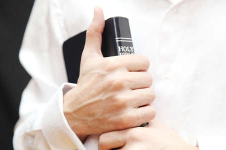 Men with Holy Bible