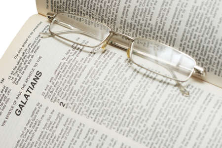 Open Bible with glassesの写真素材