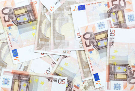 fifty euro banknotes scattered on the floor