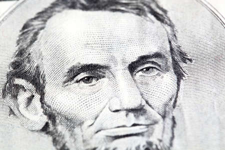 Portrait of Abraham Lincoln in front of the five dollar billの写真素材