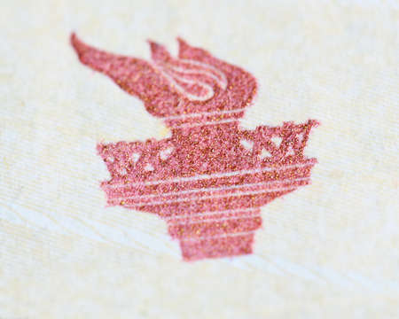 torch on the dollar bill. close-up photoの写真素材