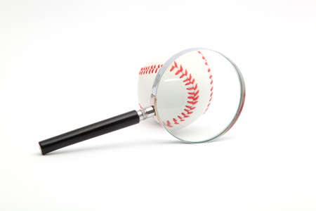 lens and a baseball on a white background