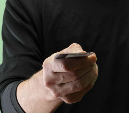 boys hand with a credit cardの写真素材