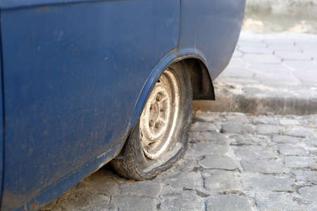 punched a car wheelの写真素材