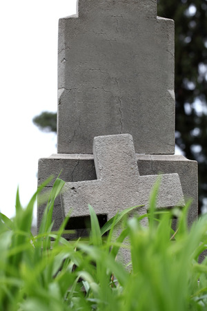 old cement cross on the cemeteryの写真素材