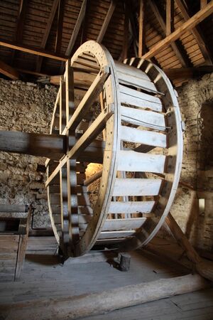wooden wheel to a well 