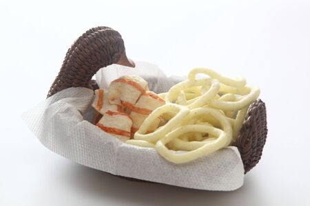 potato chips in a wooden plate in the form of a duckの写真素材