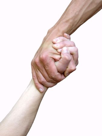 Hand in a hand on a background a rock                               