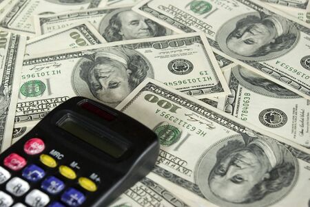 calculator on a background dollars