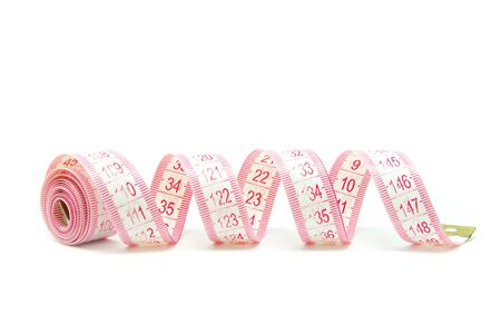 Measuring tape of the tailor on white
