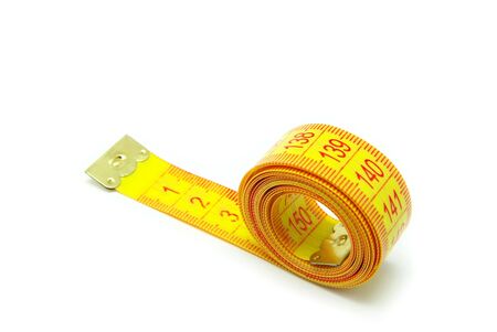 Measuring tape of the tailor on white