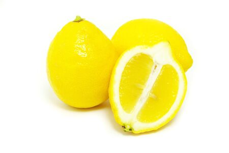 yellow fresh lemons isolated on a whiteの写真素材
