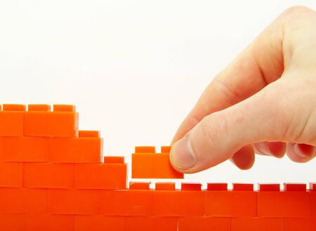 compleeting the wall on a white backgroundの写真素材