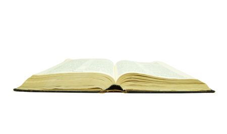 The opened bible is isolated on a white backgroundの写真素材