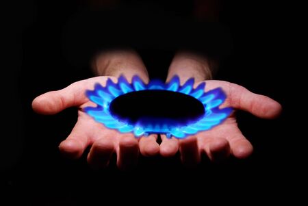 ðands holding a flame gasの写真素材