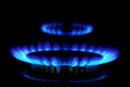 flames of gas stove in the dark