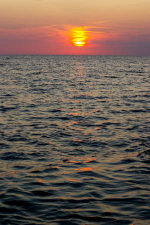 Fantastic sunset over the sea  の写真素材