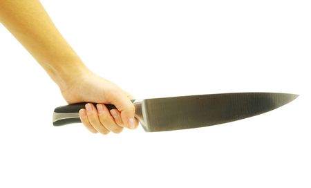 Knife in a hand isolated on white