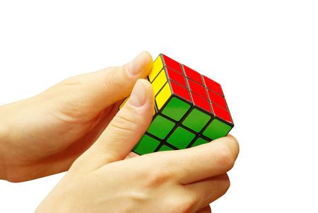 hands trying to resolve the puzzleのeditorial素材