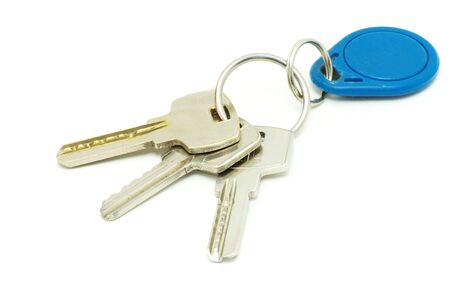 two gold keys isolated on white background