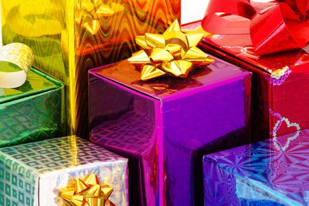 Christmas box gifts with satin bow isolated on white backgroundの写真素材