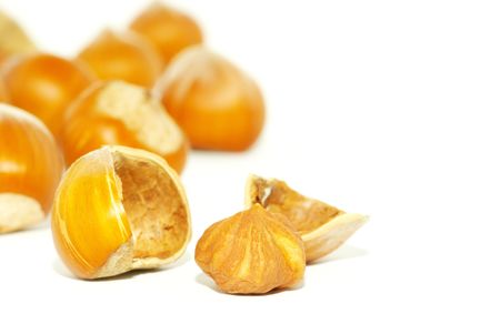 Much hazelnuts isolated on white       の写真素材