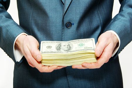 Hand with money isolated on white background