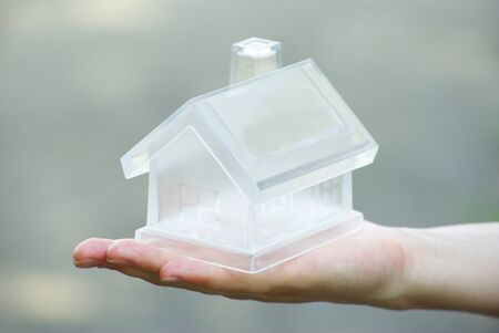 The house in human handの写真素材