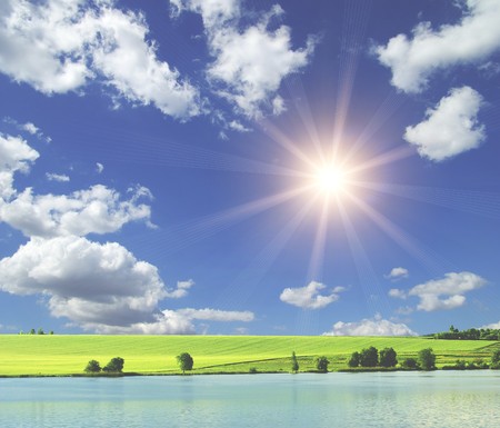 field on a background of the blue skyの写真素材