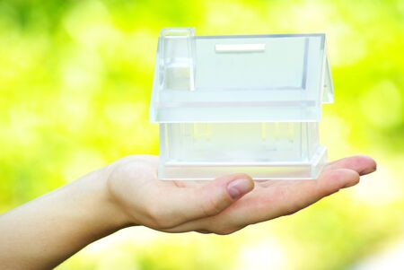 The house in human handの写真素材