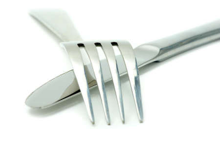 Fork, spoon and knife isolated on white backgroundの写真素材