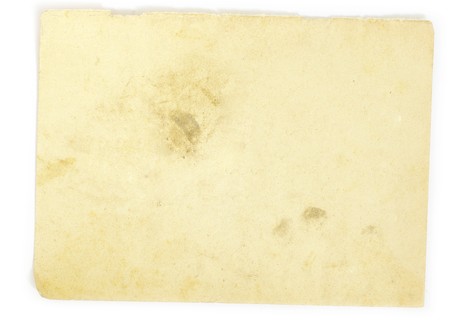 old note paper isolated on white backgroundの写真素材