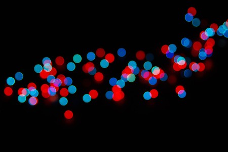 Abstract christmas lights as background on black