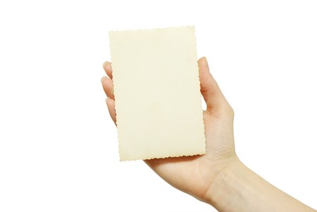 card blank in a hand on whiteの写真素材